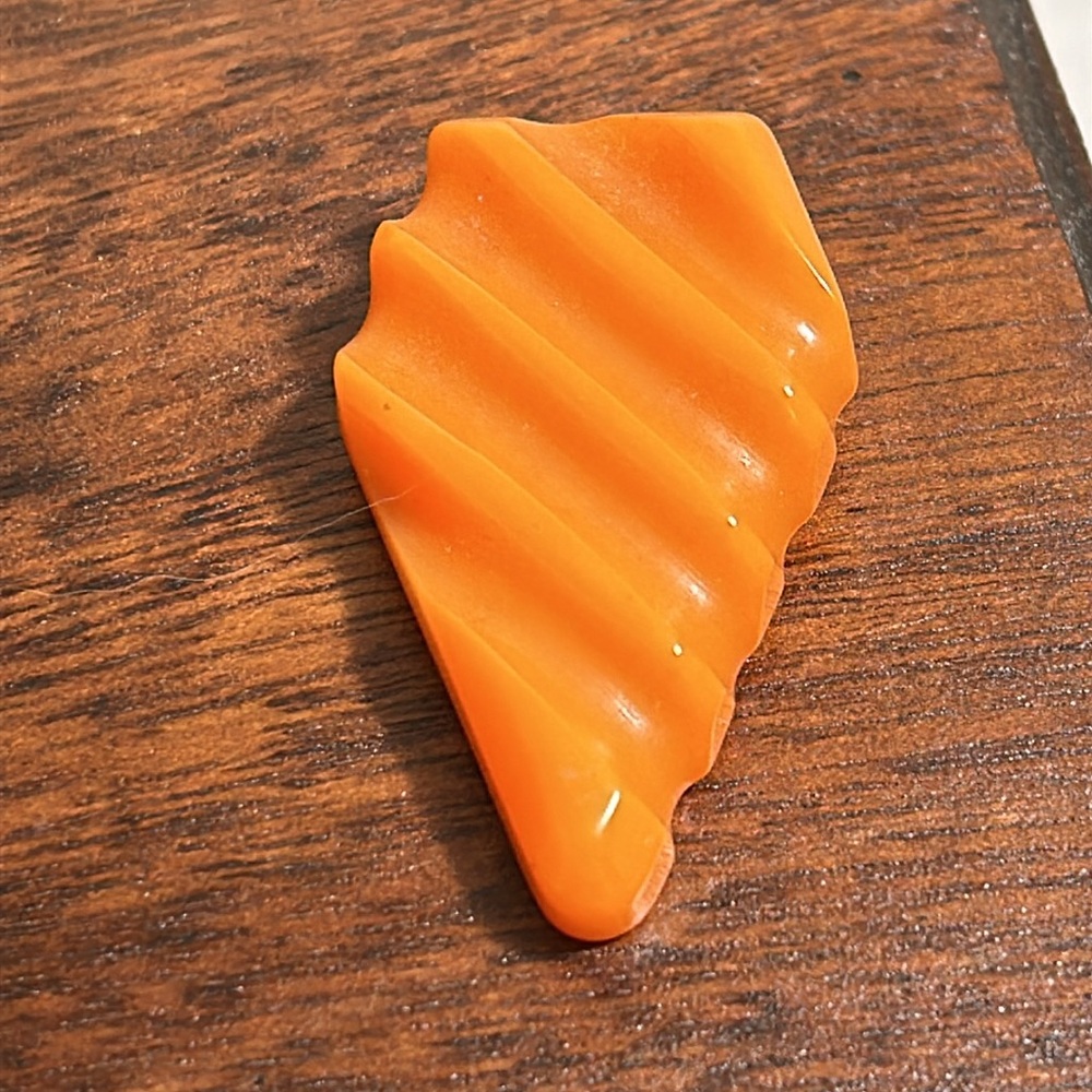 Vintage Bakelite USA Carved Orange Dress Scarf Clip